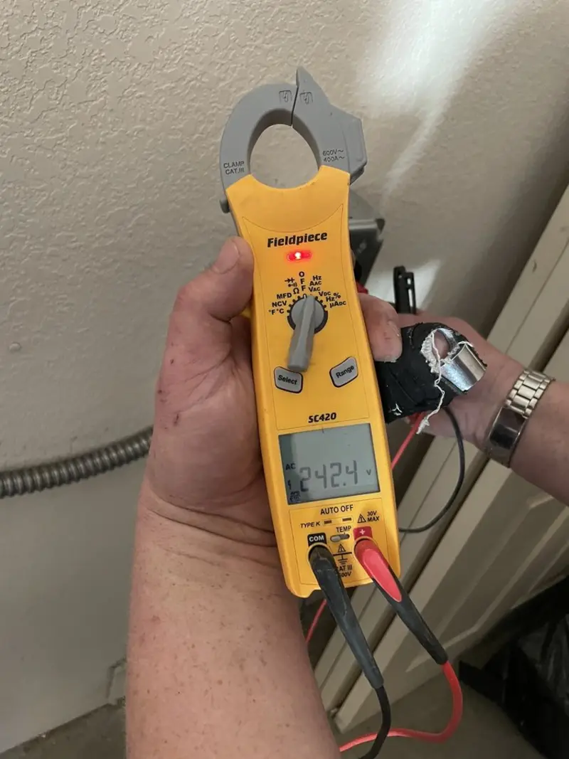Voltage testing with clamp meter during Circuit Breaker Repair in North Royalton